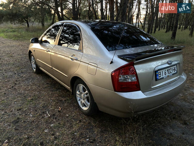 Бежевий Кіа Черато, об'ємом двигуна 1.6 л та пробігом 285 тис. км за 5300 $, фото 12 на Automoto.ua