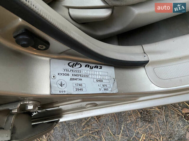 Бежевий Кіа Черато, об'ємом двигуна 1.6 л та пробігом 285 тис. км за 5300 $, фото 28 на Automoto.ua