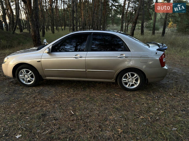 Бежевий Кіа Черато, об'ємом двигуна 1.6 л та пробігом 285 тис. км за 5300 $, фото 14 на Automoto.ua