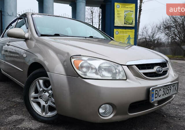 Бежевый Киа Черато, объемом двигателя 1.59 л и пробегом 202 тыс. км за 4800 $, фото 2 на Automoto.ua