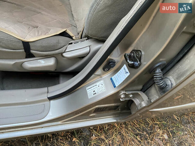 Бежевий Кіа Черато, об'ємом двигуна 1.6 л та пробігом 285 тис. км за 5300 $, фото 19 на Automoto.ua