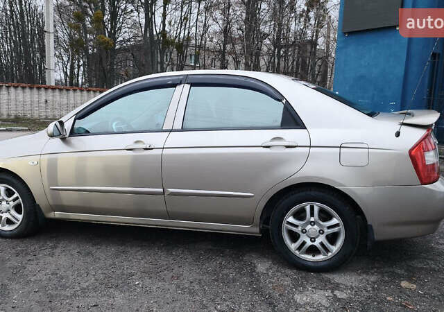 Бежевый Киа Черато, объемом двигателя 1.59 л и пробегом 202 тыс. км за 4800 $, фото 6 на Automoto.ua