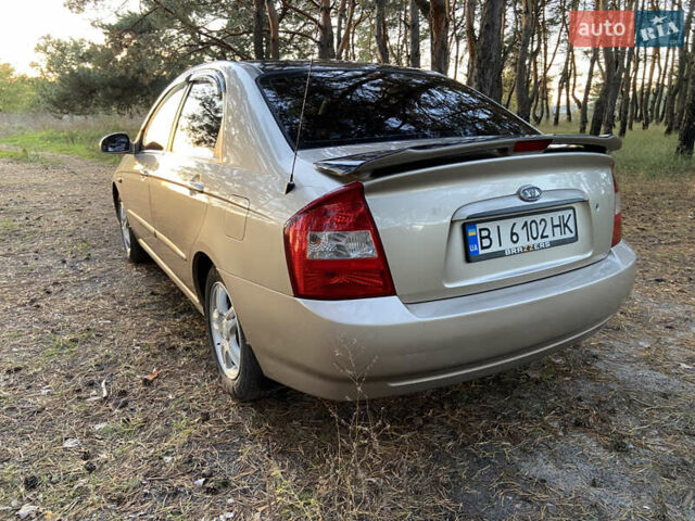 Бежевий Кіа Черато, об'ємом двигуна 1.6 л та пробігом 285 тис. км за 5300 $, фото 9 на Automoto.ua