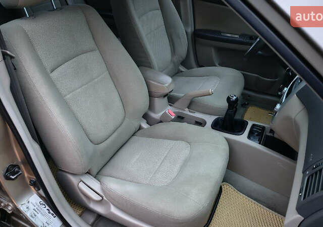 Бежевый Киа Черато, объемом двигателя 1.59 л и пробегом 202 тыс. км за 4800 $, фото 22 на Automoto.ua