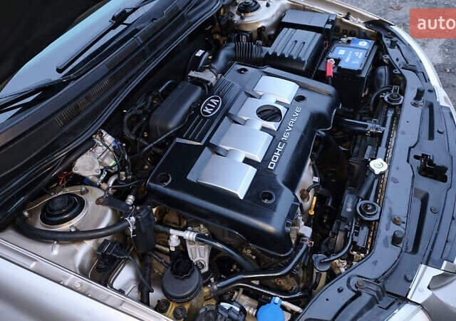 Бежевый Киа Черато, объемом двигателя 1.59 л и пробегом 202 тыс. км за 4800 $, фото 31 на Automoto.ua