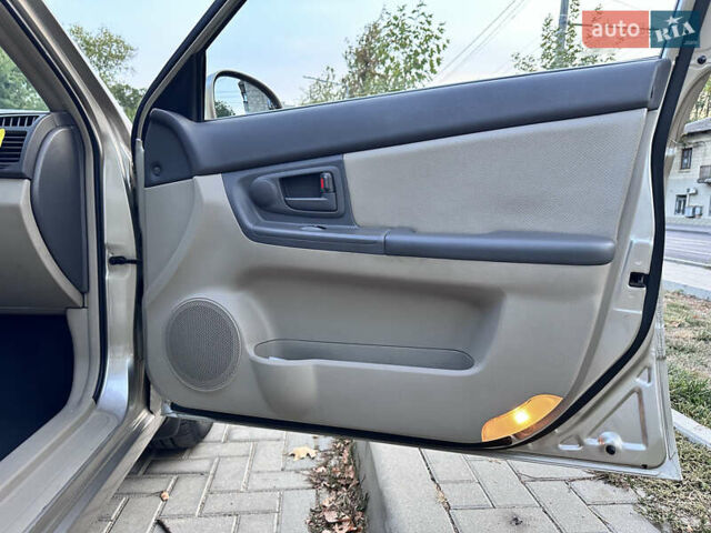 Бежевый Киа Черато, объемом двигателя 1.6 л и пробегом 79 тыс. км за 5800 $, фото 22 на Automoto.ua