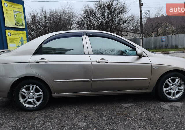 Бежевый Киа Черато, объемом двигателя 1.59 л и пробегом 202 тыс. км за 4800 $, фото 13 на Automoto.ua