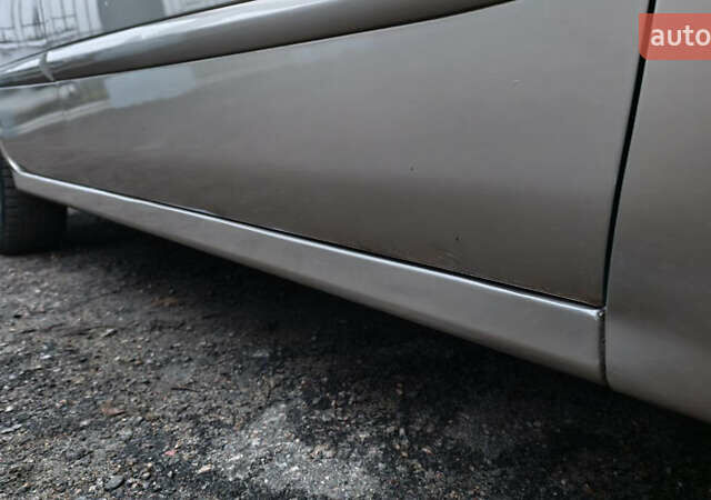 Бежевый Киа Черато, объемом двигателя 1.59 л и пробегом 202 тыс. км за 4800 $, фото 15 на Automoto.ua