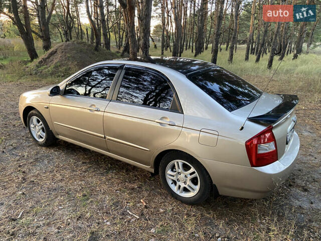 Бежевий Кіа Черато, об'ємом двигуна 1.6 л та пробігом 285 тис. км за 5300 $, фото 15 на Automoto.ua