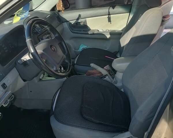 Бежевый Киа Черато, объемом двигателя 1.6 л и пробегом 196 тыс. км за 4300 $, фото 6 на Automoto.ua