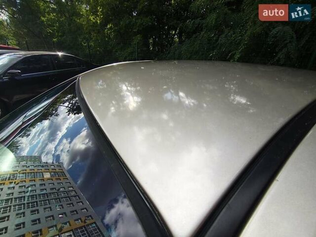 Бежевый Киа Черато, объемом двигателя 1.6 л и пробегом 440 тыс. км за 3200 $, фото 4 на Automoto.ua