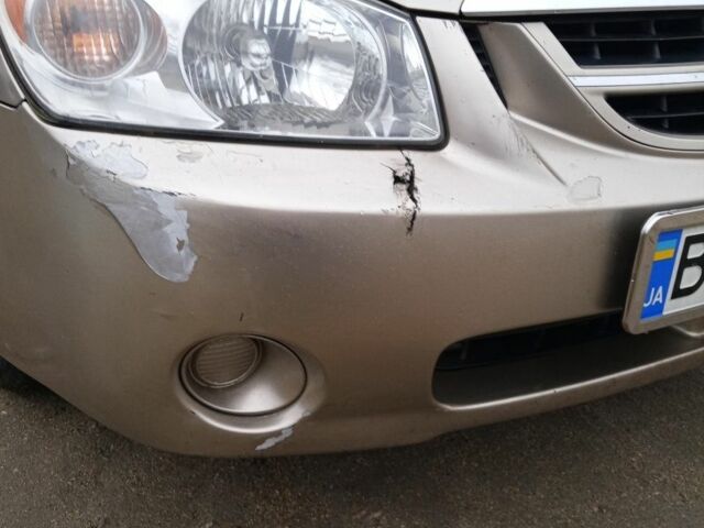 Бежевий Кіа Черато, об'ємом двигуна 1.6 л та пробігом 300 тис. км за 4500 $, фото 7 на Automoto.ua