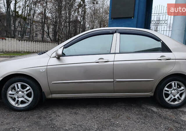 Бежевый Киа Черато, объемом двигателя 1.59 л и пробегом 202 тыс. км за 4800 $, фото 5 на Automoto.ua