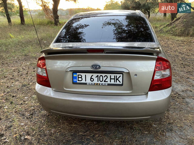 Бежевий Кіа Черато, об'ємом двигуна 1.6 л та пробігом 285 тис. км за 5300 $, фото 7 на Automoto.ua