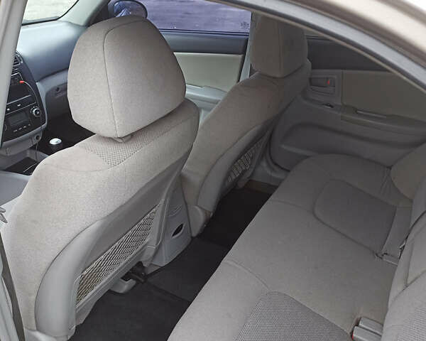 Бежевый Киа Черато, объемом двигателя 1.98 л и пробегом 212 тыс. км за 4500 $, фото 11 на Automoto.ua