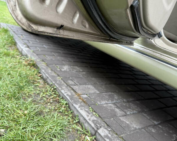 Бежевий Кіа Черато, об'ємом двигуна 1.6 л та пробігом 340 тис. км за 3999 $, фото 7 на Automoto.ua