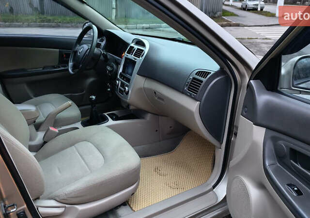 Бежевый Киа Черато, объемом двигателя 1.59 л и пробегом 202 тыс. км за 4800 $, фото 23 на Automoto.ua