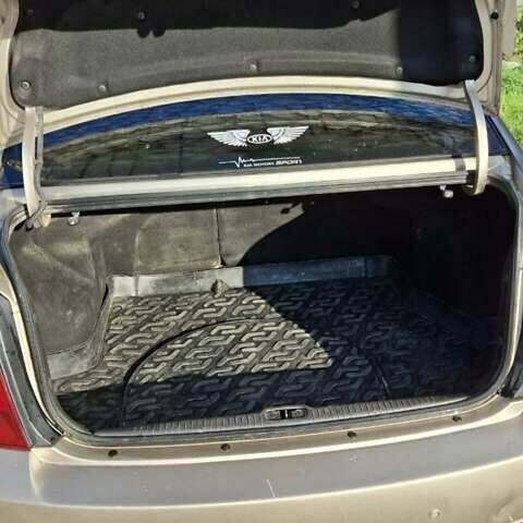 Бежевый Киа Черато, объемом двигателя 2 л и пробегом 200 тыс. км за 3750 $, фото 5 на Automoto.ua