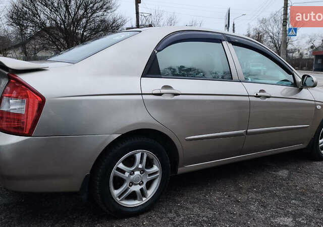 Бежевый Киа Черато, объемом двигателя 1.59 л и пробегом 202 тыс. км за 4800 $, фото 12 на Automoto.ua