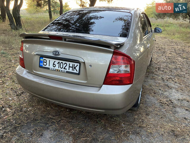 Бежевий Кіа Черато, об'ємом двигуна 1.6 л та пробігом 285 тис. км за 5300 $, фото 6 на Automoto.ua