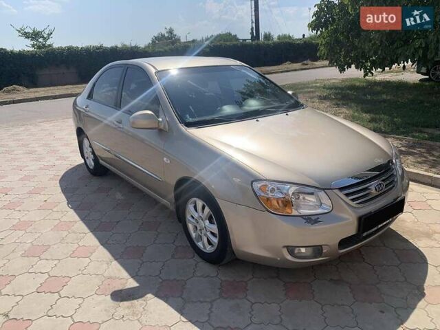 Бежевый Киа Черато, объемом двигателя 2 л и пробегом 171 тыс. км за 5000 $, фото 1 на Automoto.ua