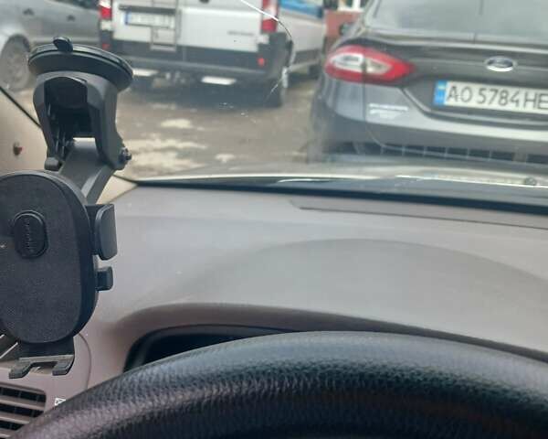 Бежевый Киа Черато, объемом двигателя 2 л и пробегом 245 тыс. км за 4500 $, фото 6 на Automoto.ua