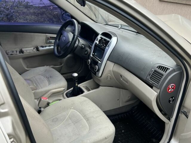 Бежевий Кіа Черато, об'ємом двигуна 1.6 л та пробігом 312 тис. км за 1800 $, фото 5 на Automoto.ua