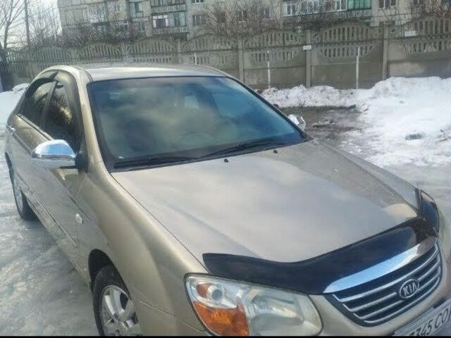 Бежевий Кіа Черато, об'ємом двигуна 2 л та пробігом 222 тис. км за 4900 $, фото 2 на Automoto.ua