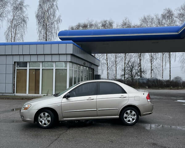 Бежевий Кіа Черато, об'ємом двигуна 1.6 л та пробігом 230 тис. км за 3700 $, фото 7 на Automoto.ua