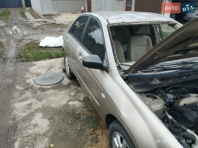 Бежевый Киа Черато, объемом двигателя 1.59 л и пробегом 208 тыс. км за 1900 $, фото 7 на Automoto.ua