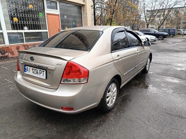 Бежевый Киа Черато, объемом двигателя 2 л и пробегом 195 тыс. км за 4250 $, фото 1 на Automoto.ua