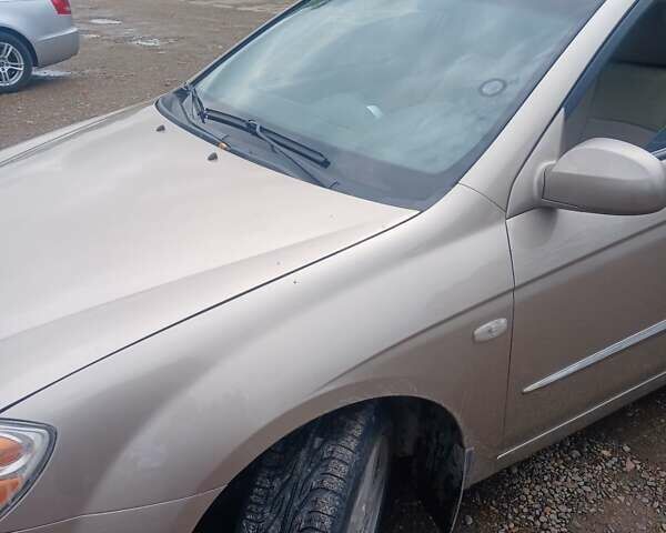 Бежевый Киа Черато, объемом двигателя 2 л и пробегом 245 тыс. км за 4500 $, фото 7 на Automoto.ua