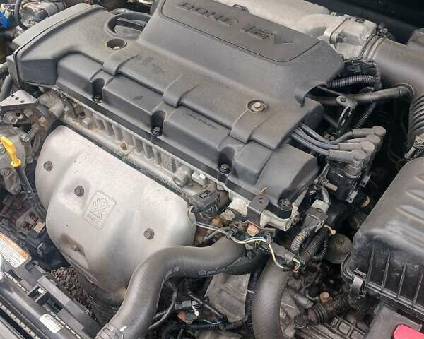 Бежевый Киа Черато, объемом двигателя 2 л и пробегом 245 тыс. км за 4500 $, фото 13 на Automoto.ua