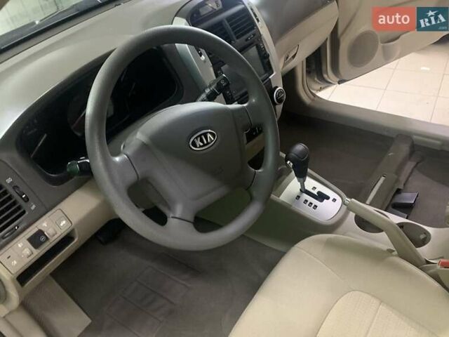 Бежевый Киа Черато, объемом двигателя 2 л и пробегом 171 тыс. км за 5000 $, фото 5 на Automoto.ua