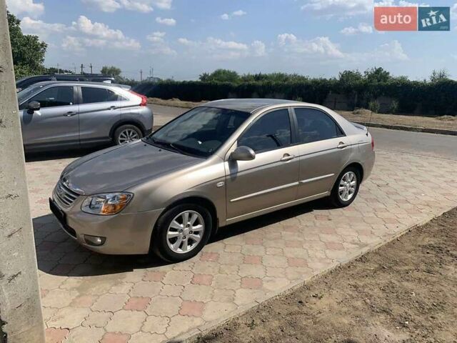 Бежевый Киа Черато, объемом двигателя 2 л и пробегом 171 тыс. км за 5000 $, фото 2 на Automoto.ua