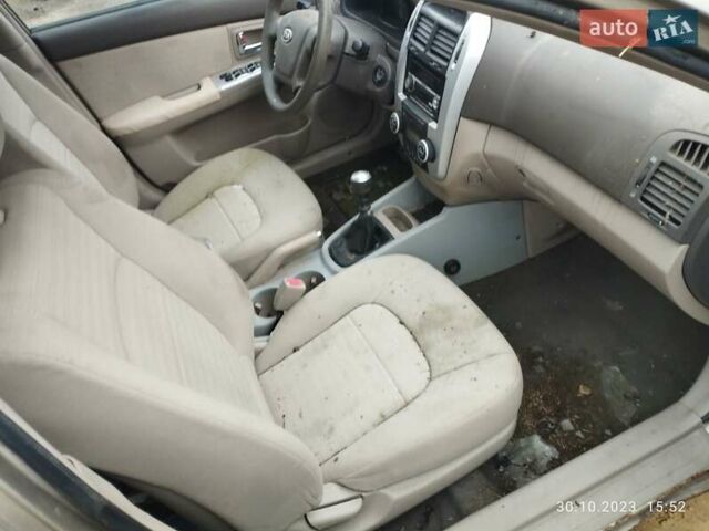 Бежевый Киа Черато, объемом двигателя 1.59 л и пробегом 208 тыс. км за 1900 $, фото 14 на Automoto.ua