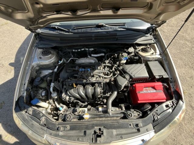 Бежевый Киа Черато, объемом двигателя 1.6 л и пробегом 218 тыс. км за 5200 $, фото 6 на Automoto.ua