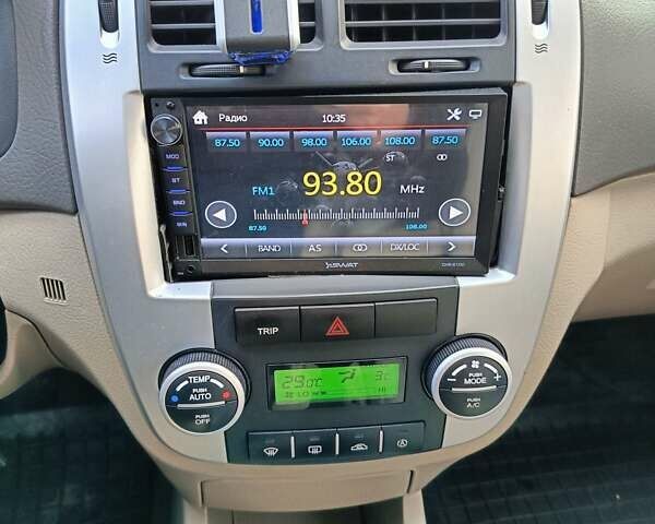 Бежевый Киа Черато, объемом двигателя 1.98 л и пробегом 195 тыс. км за 3993 $, фото 14 на Automoto.ua