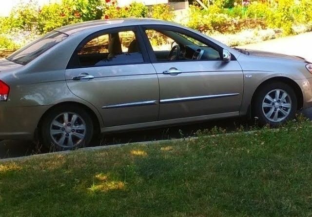 Бежевий Кіа Черато, об'ємом двигуна 2 л та пробігом 222 тис. км за 4900 $, фото 4 на Automoto.ua