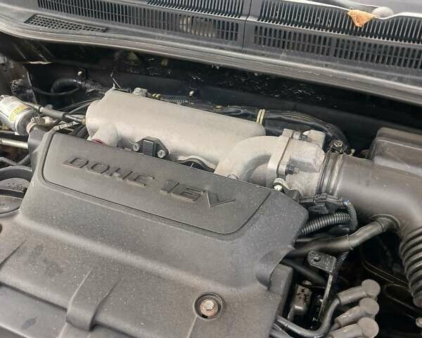 Бежевый Киа Черато, объемом двигателя 2 л и пробегом 245 тыс. км за 4500 $, фото 16 на Automoto.ua