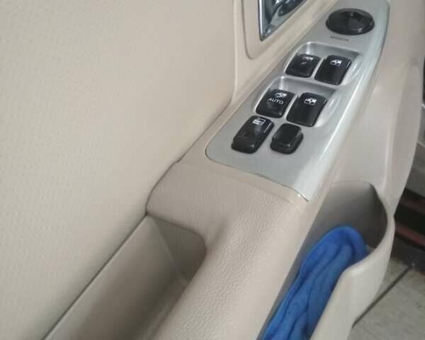 Бежевый Киа Черато, объемом двигателя 1.98 л и пробегом 222 тыс. км за 5200 $, фото 12 на Automoto.ua