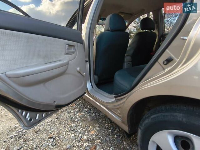 Бежевий Кіа Черато, об'ємом двигуна 1.59 л та пробігом 155 тис. км за 3700 $, фото 14 на Automoto.ua