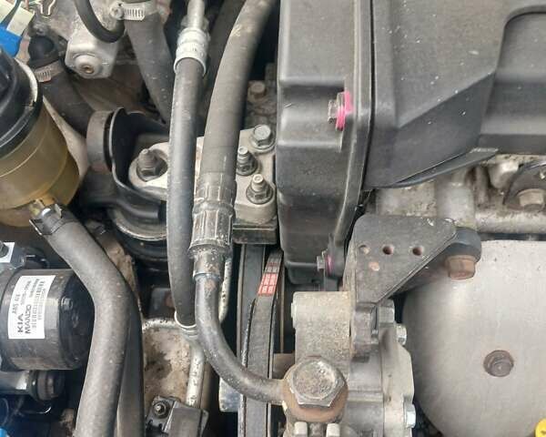 Бежевый Киа Черато, объемом двигателя 2 л и пробегом 245 тыс. км за 4500 $, фото 14 на Automoto.ua