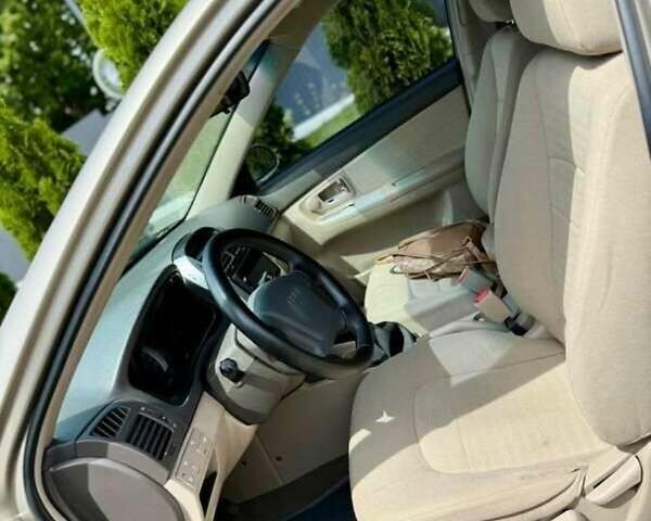 Бежевий Кіа Черато, об'ємом двигуна 2 л та пробігом 250 тис. км за 3500 $, фото 4 на Automoto.ua