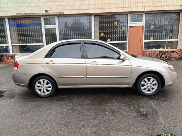 Бежевый Киа Черато, объемом двигателя 2 л и пробегом 195 тыс. км за 4250 $, фото 2 на Automoto.ua