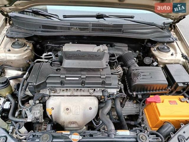 Бежевый Киа Черато, объемом двигателя 2 л и пробегом 195 тыс. км за 4250 $, фото 10 на Automoto.ua