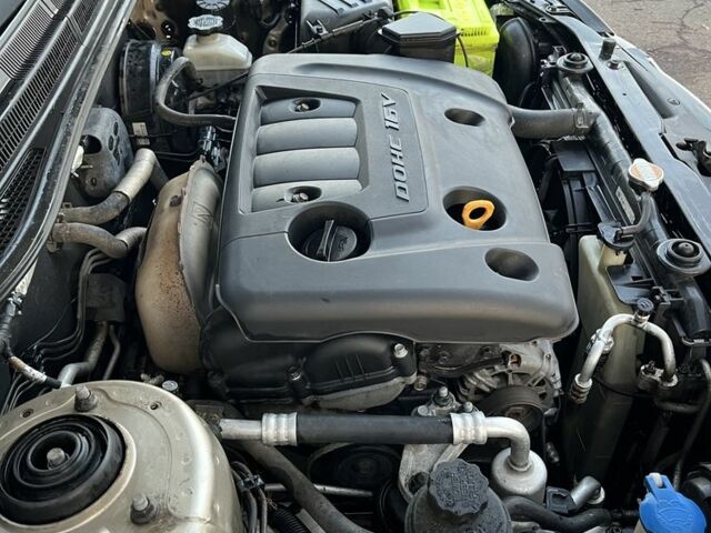 Бежевый Киа Черато, объемом двигателя 1.6 л и пробегом 268 тыс. км за 3900 $, фото 7 на Automoto.ua