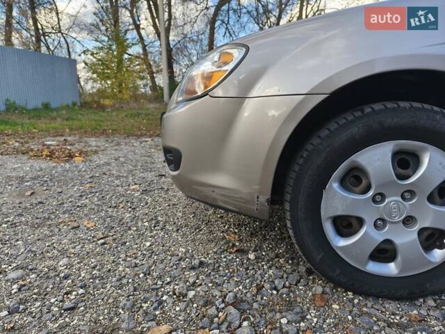 Бежевий Кіа Черато, об'ємом двигуна 1.59 л та пробігом 155 тис. км за 3700 $, фото 8 на Automoto.ua