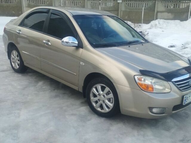 Бежевий Кіа Черато, об'ємом двигуна 2 л та пробігом 222 тис. км за 4900 $, фото 1 на Automoto.ua