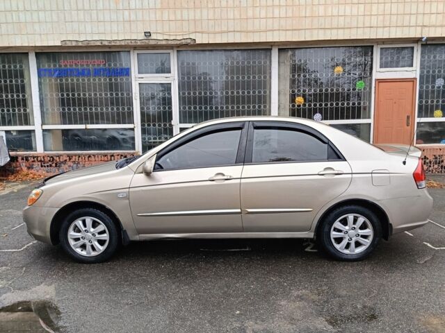 Бежевый Киа Черато, объемом двигателя 2 л и пробегом 195 тыс. км за 4250 $, фото 4 на Automoto.ua